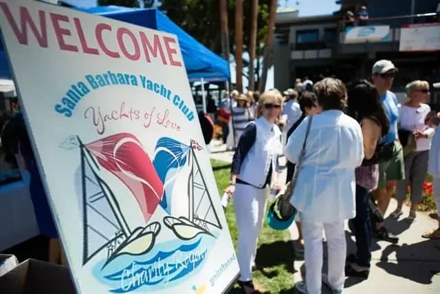 A Welcome banner at the Santa Barbara Yacht Club ‘Yachts of Love’ charity regatta — large-scale fundraising events designed and executed alongside nonprofit teams.